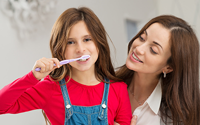 Mother and Daughter brushing
