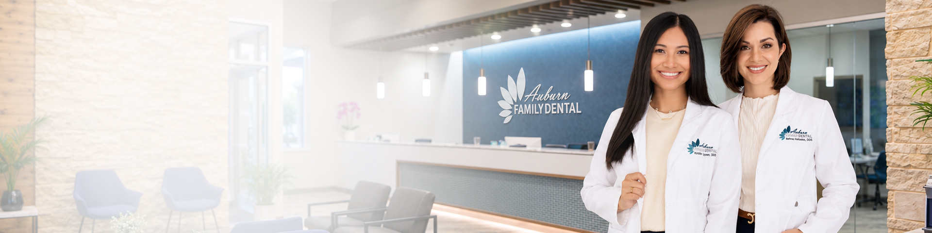 Dr. Behnaz Raisdana and Dr. Kristina Nguyen smiling in the Auburn Family Dental office in Wichita, KS
