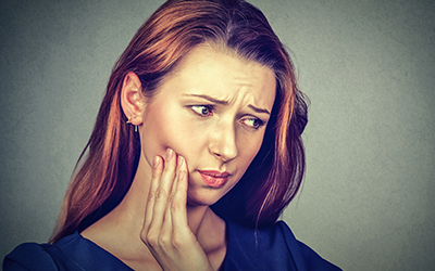 Woman with tooth pain