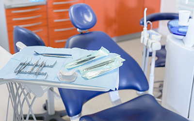 Dental tool close-up with dental chair