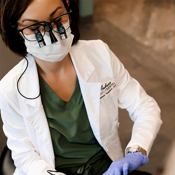 Dental hygienist providing a professional teeth cleaning during a preventive dental visit