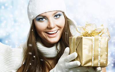 Christmas theme woman holding present