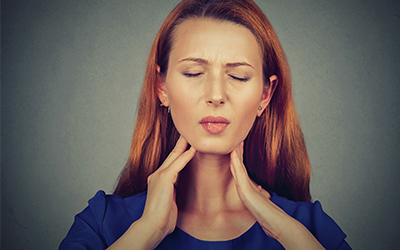 Woman with mouth pain